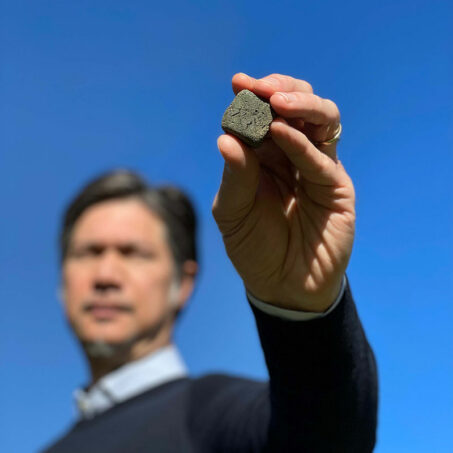 Davide Zampini, CEMEX Head of Global R&D holding the world’s first solar clinker. Source: CEMEX