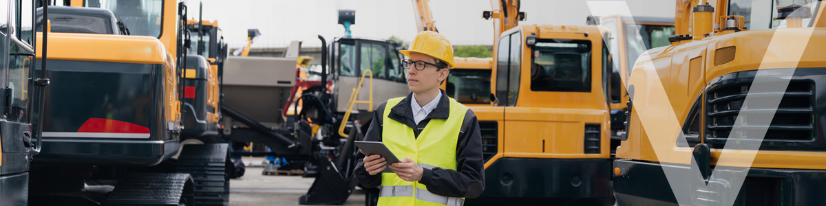 A fleet manager overseeing construction vehicles